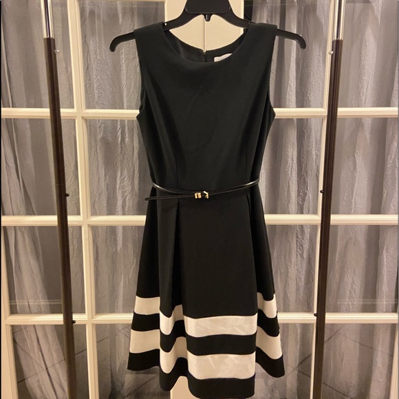 Calvin Klein Dresses & Skirts - Calvin Klein dress size 6, black with white stripes and a accent belt.